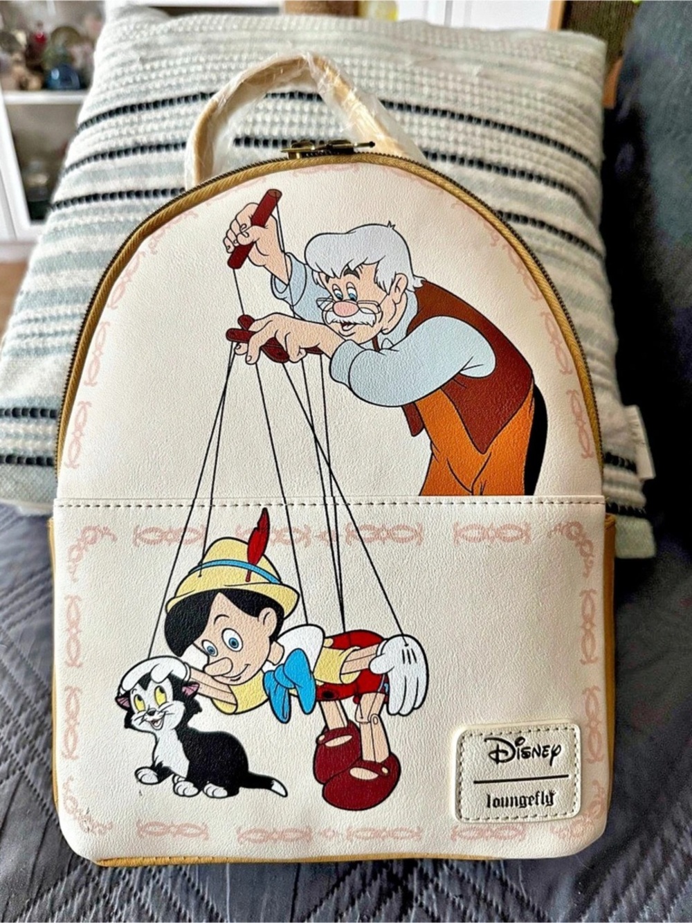 NWOT. Loungefly Disney Pinocchio Mini Backpack with Geppetto and Figaro.